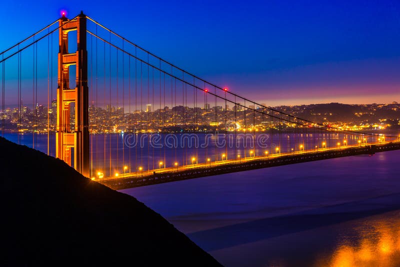 San Francisco Golden Gate Bridge sunset view through cables in California USA. San Francisco Golden Gate Bridge sunset view through cables in California USA