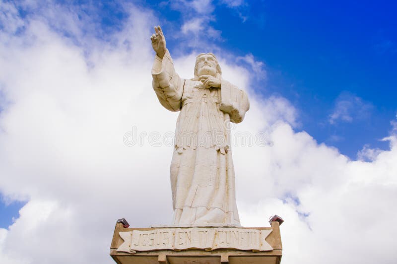 San Juan del Sur, Nicaragua - May 11, 2018: Colossal statue of Jesus Christ in the northernmost seawall in the bay of San Juan del Sur, Nicaragua. San Juan del Sur, Nicaragua - May 11, 2018: Colossal statue of Jesus Christ in the northernmost seawall in the bay of San Juan del Sur, Nicaragua.