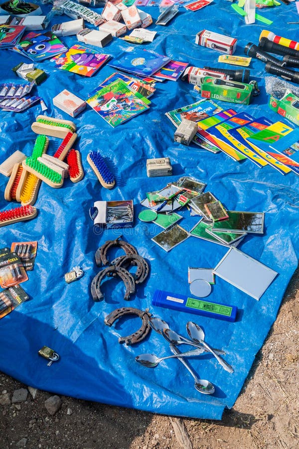 SAN MANUEL DE COLOHETE, HONDURAS - APRIL 15, 2016: Household articles at a market stall. There is a big market in this