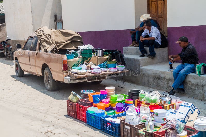 SAN MANUEL DE COLOHETE, HONDURAS - APRIL 15, 2016: Household articles sellers at a market. There is a big market in this
