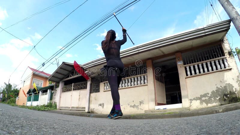 Gay fire breather dance on street