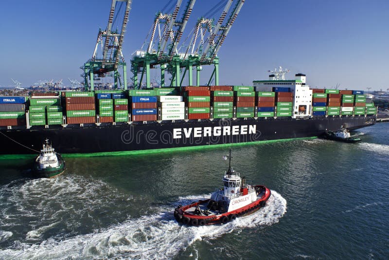 Freighter and tugboats, Port of Los Angeles, California