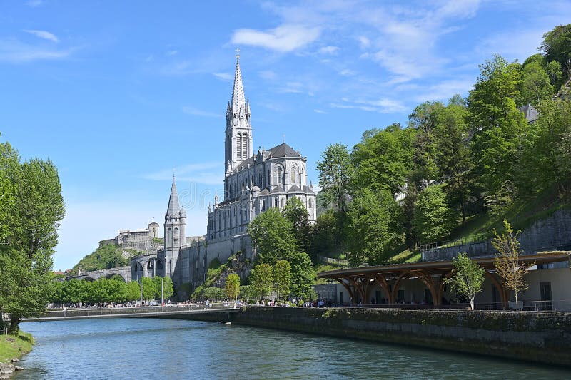 The Sanctuary of Our Lady of Lourdes, with the Piscines Du Sanctuaire ...