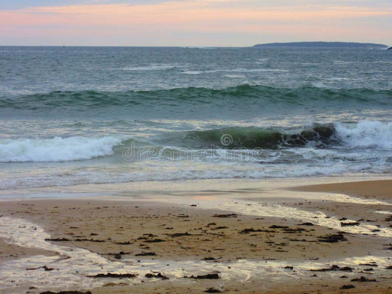 On the beach called Sand Beach in Acadia National Park in Bar Harbor, Maine, taken during the fall on a cloudy day. On the beach called Sand Beach in Acadia National Park in Bar Harbor, Maine, taken during the fall on a cloudy day.