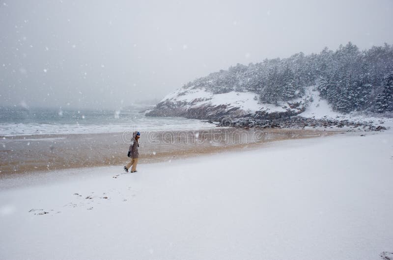 Sand Beach in Acadia National Park during a snowstorm. Sand Beach in Acadia National Park during a snowstorm.