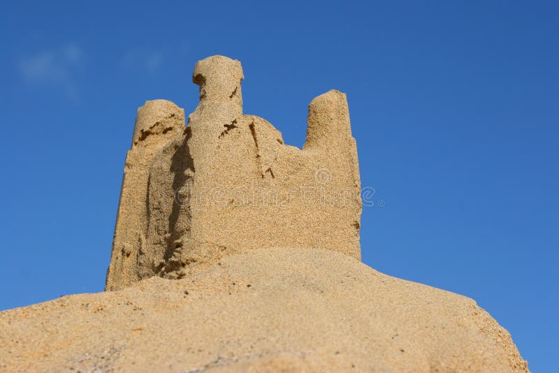 Sand castle with blue sky