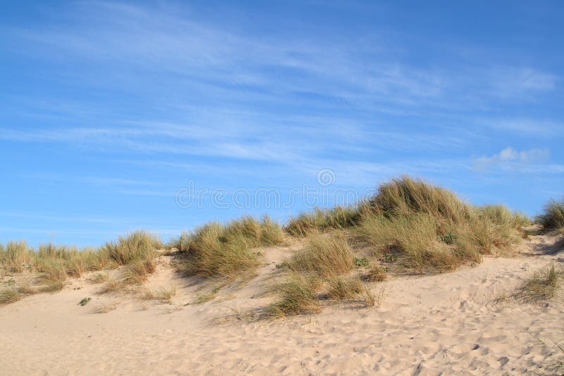 Sand dunes and a blue.