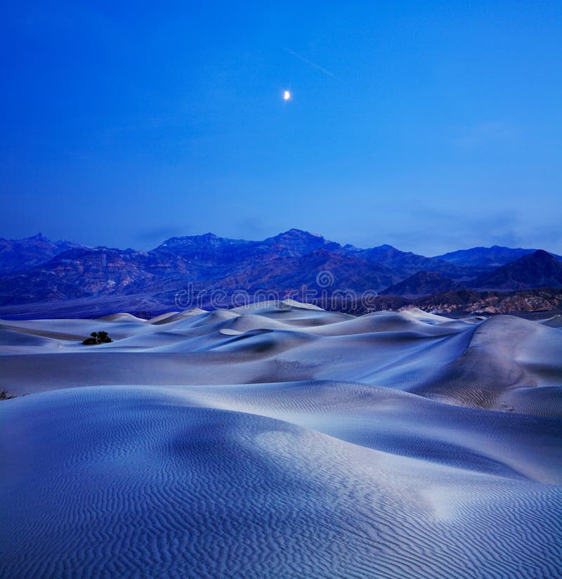 Sand Dunes And Mountains