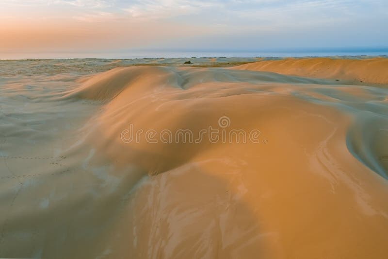 Sand Dunes Near The Ocean At Sunset. Stock Photo - Image ...
