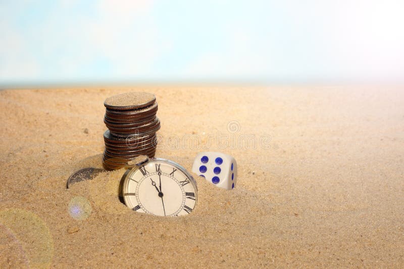 Sand maneta, clock and dice. Great illusion. A concept is a continuous fragment of the cycle of the life of the world, along with the constantly operating driving force of enrichment,. Sand fragment stock images, royalty-free photos and pictures