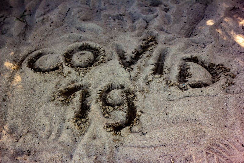 sand picture with covid 19 written, how will the coronavirus behave on the beaches? royalty free stock photography sand picture with covid 19 written, how will the coronavirus behave on the beaches? royalty free stock photography