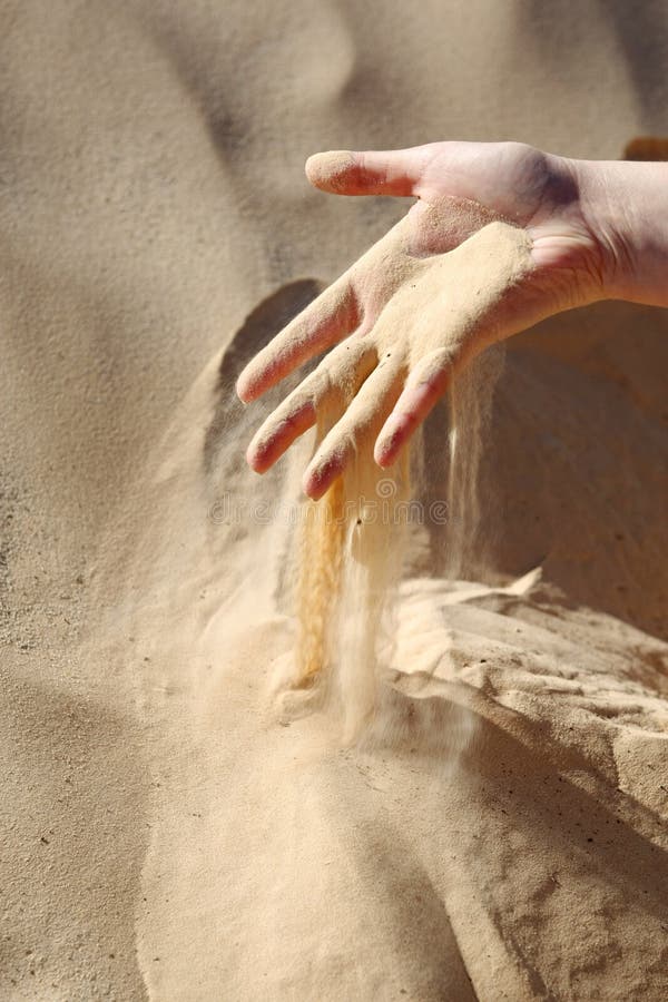Pouring sand from hands stock photo. Image of woman, beautiful 12007406