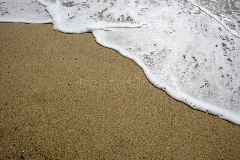 Sand and water beach detail - copyspace for your t