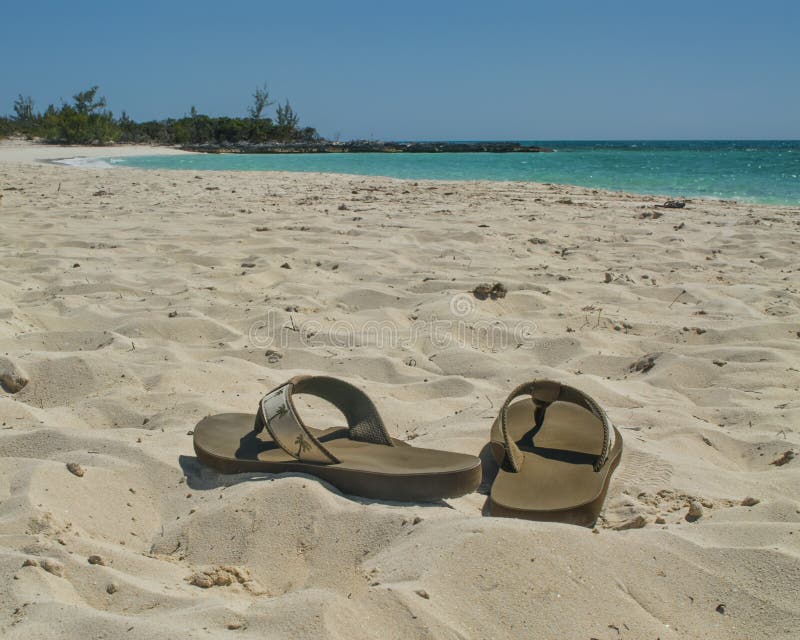 Sandali sulla spiaggia immagine stock Sandali sulla spiaggia immagine stock