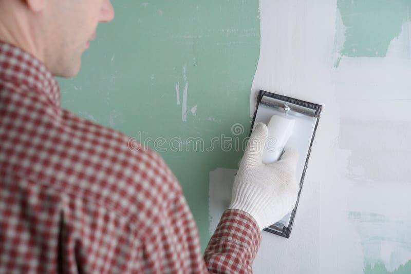 Sanding the drywall mud stock photo. Image of horizontal 36689628