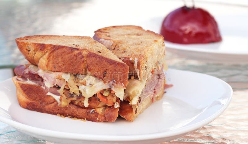 Hearty sandwich on freshly baked toasted bread with corned beef and sauerkraut. Hearty sandwich on freshly baked toasted bread with corned beef and sauerkraut