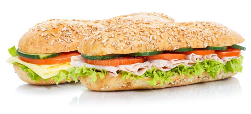 Sanduíches secundários do Baguette com grões inteiras i fresco do presunto e do queijo foto de stock royalty free Sanduíches secundários do Baguette com grões inteiras i fresco do presunto e do queijo foto de stock royalty free