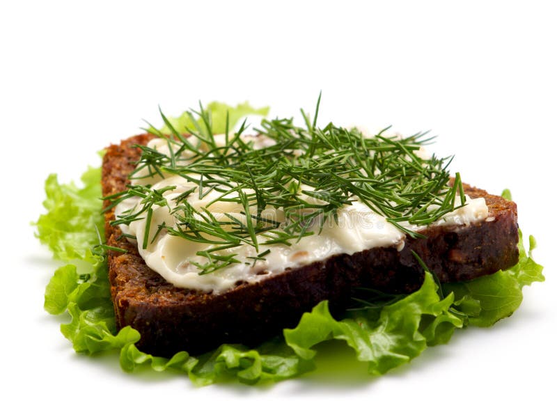 Sandwich with cheese and aromatic herbs.