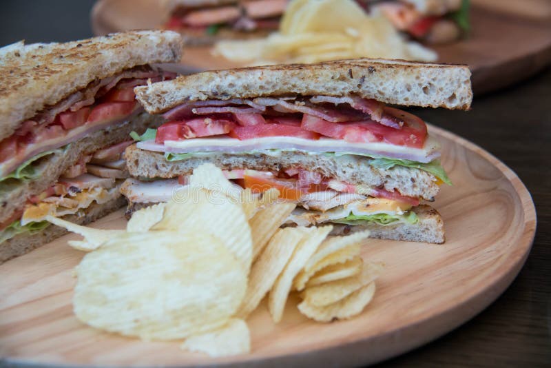 Sandwich closeup with tomatoes chip potato