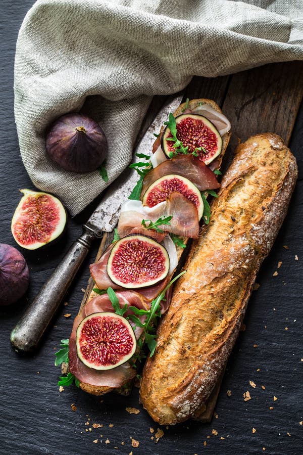 Figs with Prosciutto, Goat Cheese and Rosemary Stock Photo Image of