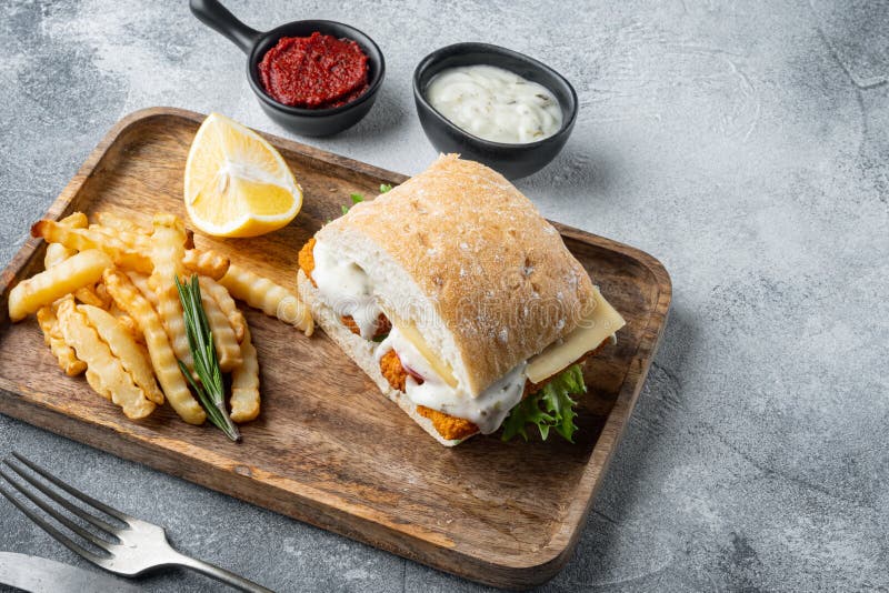 Sandwich with Fish Sticks, on gray background , with copyspace and space for text stock photo