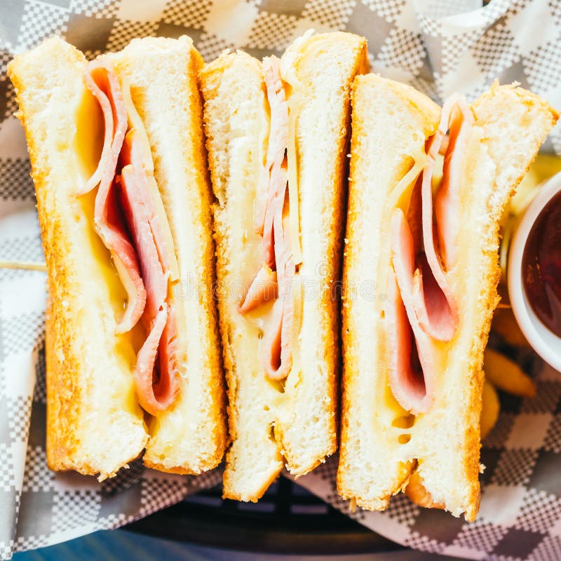Sandwich with Ham Cheese and French Fries and Tomato Sauce Stock Image