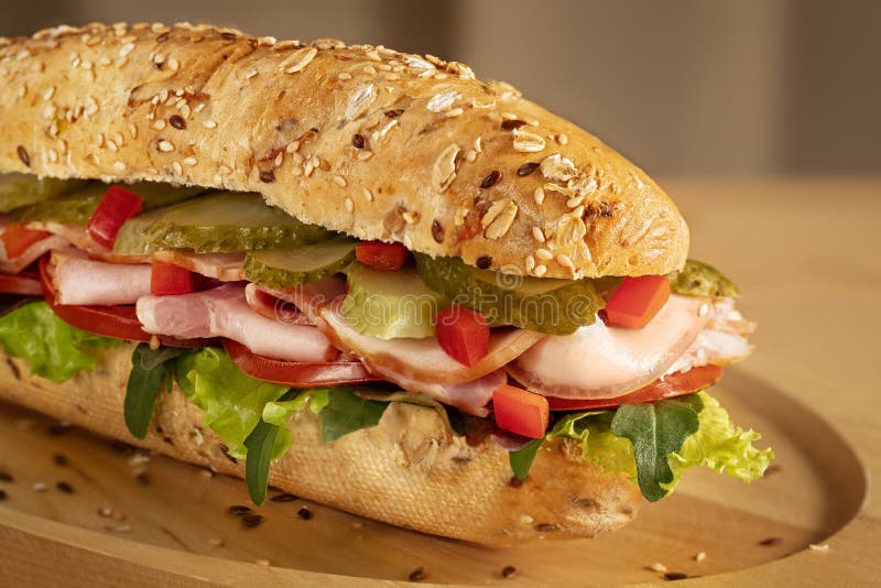 Sandwich with ham, pickles, fresh tomato and green salad stock photos Sandwich with ham, pickles, fresh tomato and green salad stock photos