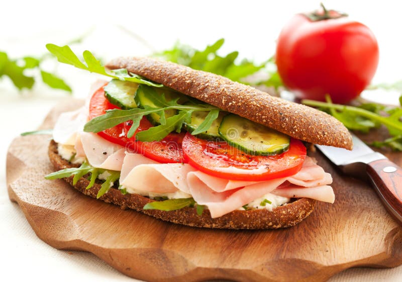 Sandwich with ham and vegetables