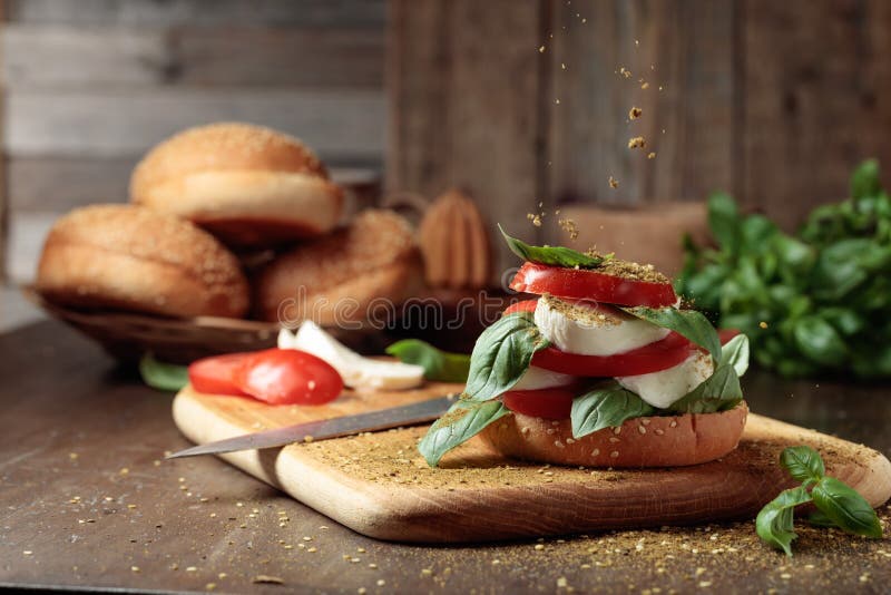 Sandwich with Mozzarella, Tomatoes, and Basil Stock Image Image of