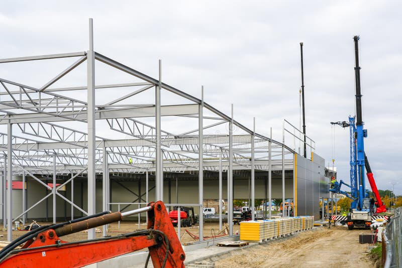 Sandwich Panel Wall Assembly on an Assembled Steel Frame of a New Warehouse Building Stock Image