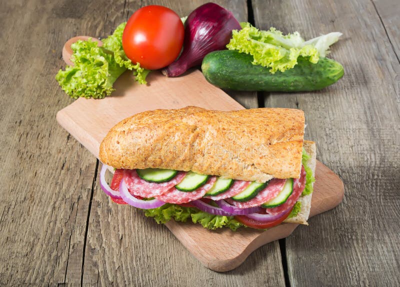 Sandwich with Salami, Tomato and Lettuce Stock Photo Image of leaf