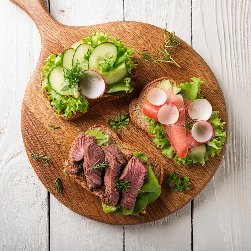 Sandwiches with beef, fresh vegetables and herbs on rustic wooden chopping board over white wood backdrop, top view. stock illustration