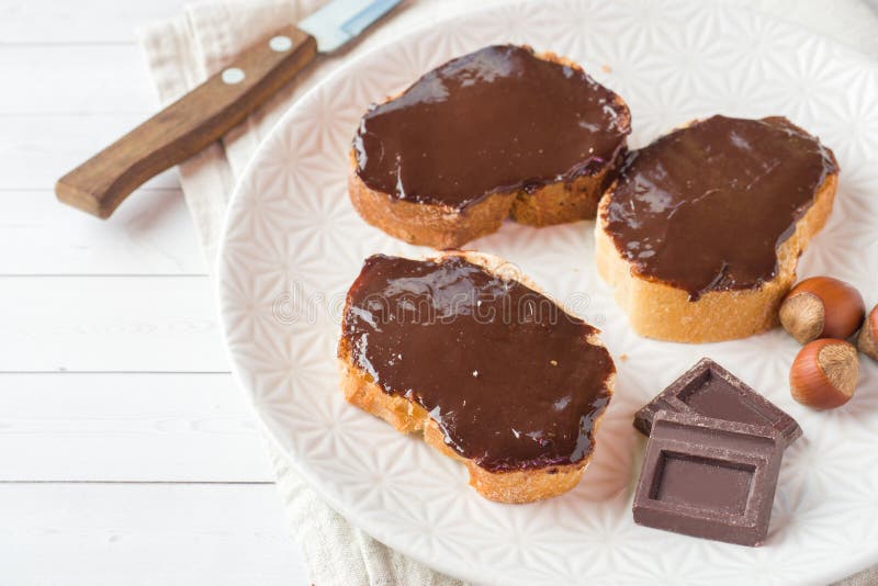 Sandwiches with Chocolate Hazelnut Spread on the Plate. Stock Photo Image of isolated, knife