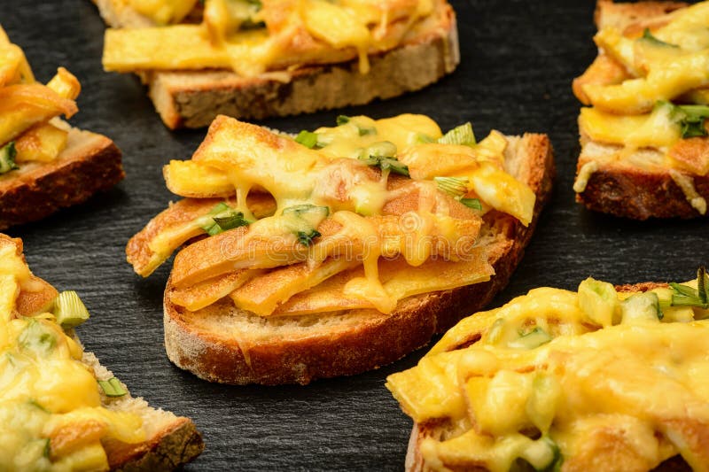 Sandwiches with Fried Eggs and Cheese Baked in Oven. Stock Image