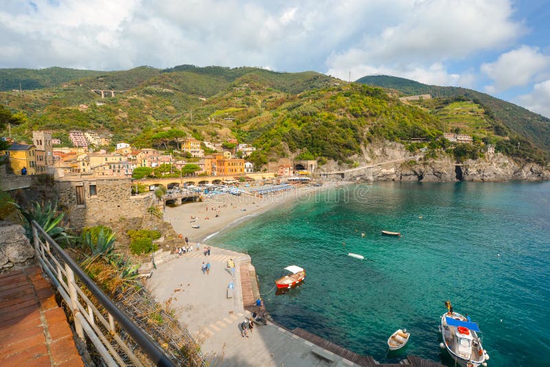 Sandy beach and the Old Town of the village of Monterosso Al Mare on the Ligurian coast of Cinque Terre, Italy. The sandy beach at the old town section of stock images Sandy beach and the Old Town of the village of Monterosso Al Mare on the Ligurian coast of Cinque Terre, Italy. The sandy beach at the old town section of stock images