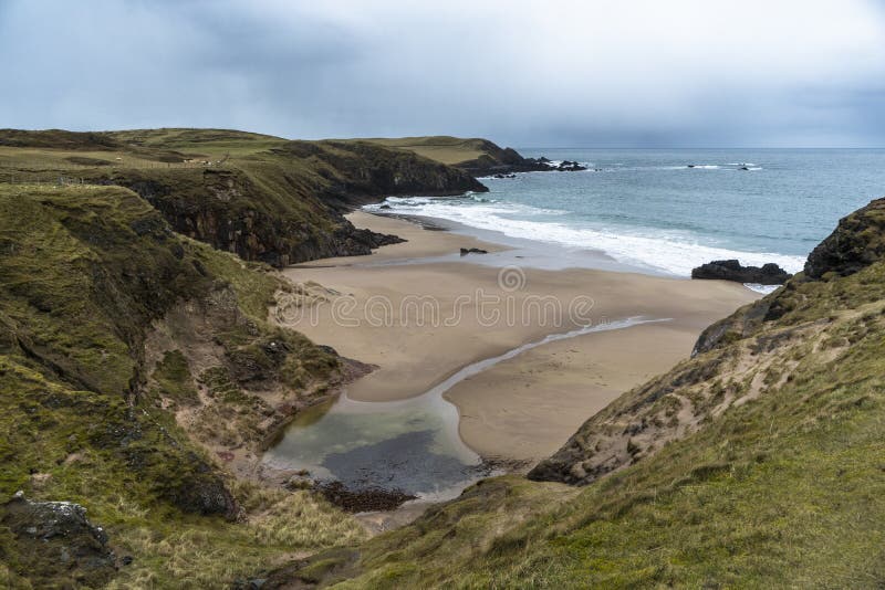 Sandy Beach with a River and Cliffs Around Stock Photo Image of