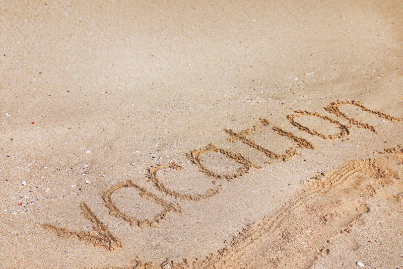 Sandy beach with written word Vacation on sunny day. royalty free stock image Sandy beach with written word Vacation on sunny day. royalty free stock image