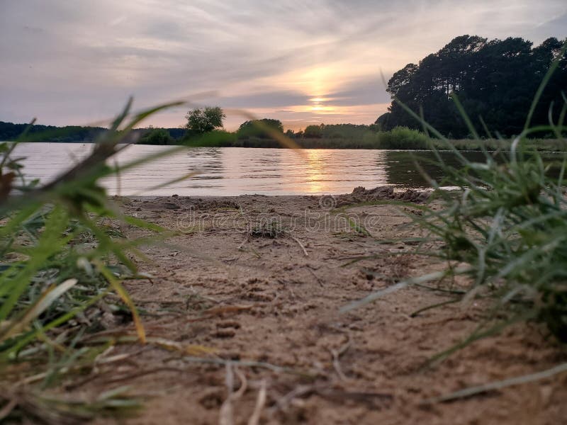Sandy Lake sunset royaltyfri bild Sandy Lake sunset royaltyfri bild