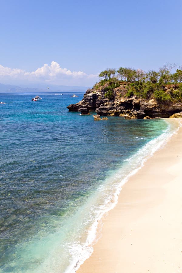 Sandy ocean coast and rocks. Bali. Indonesia royalty free stock images Sandy ocean coast and rocks. Bali. Indonesia royalty free stock images