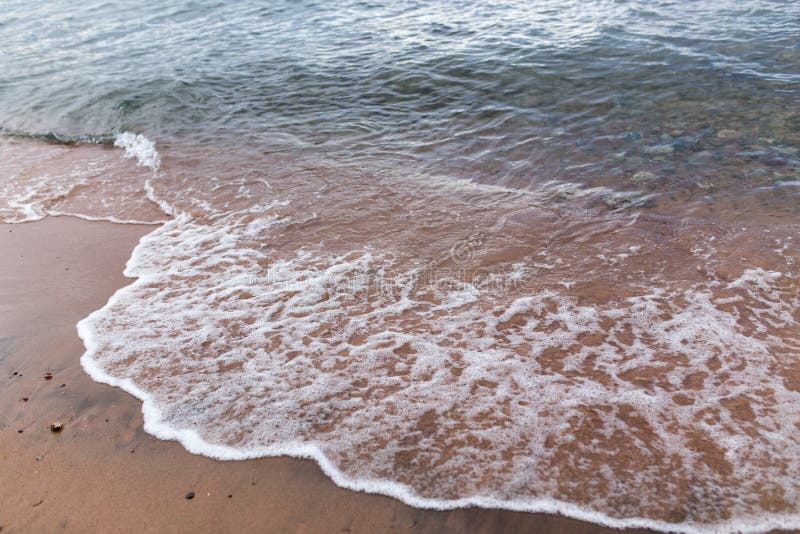 Sandy shore of the sea as a backdrop stock photos Sandy shore of the sea as a backdrop stock photos