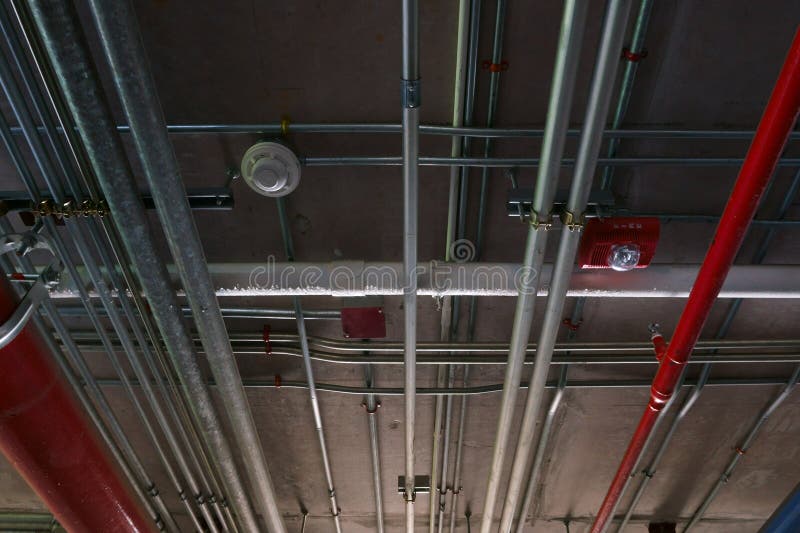 Sanitary System Pipes and Electrical Cables Installed Under Flat Slab
