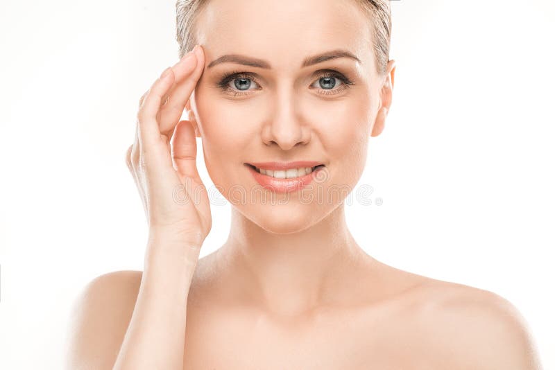 Sanità matura di bellezza della donna isolata su bianco fotografie stock Sanità matura di bellezza della donna isolata su bianco fotografie stock
