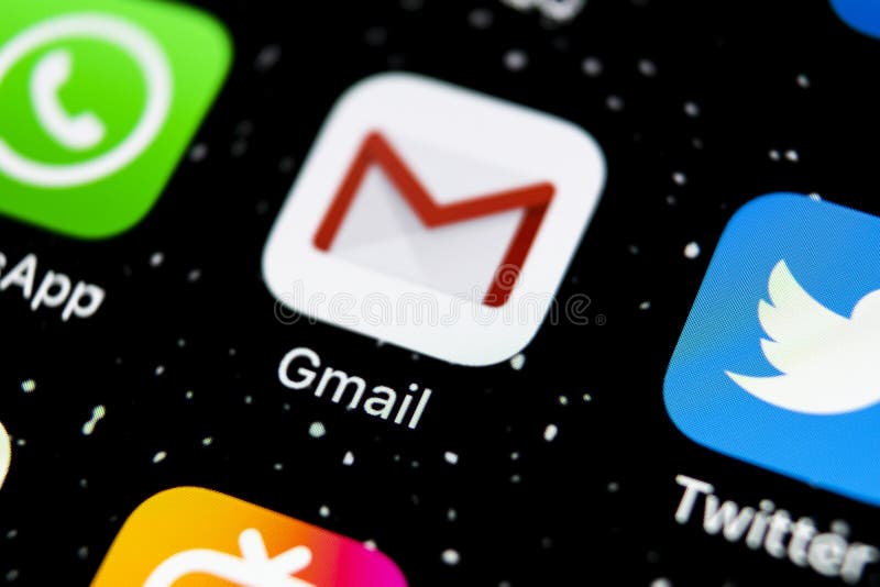 Google Gmail application icon on Apple iPhone X smartphone screen close-up. Gmail app icon. Gmail is popular Internet online e-ma royalty free stock image