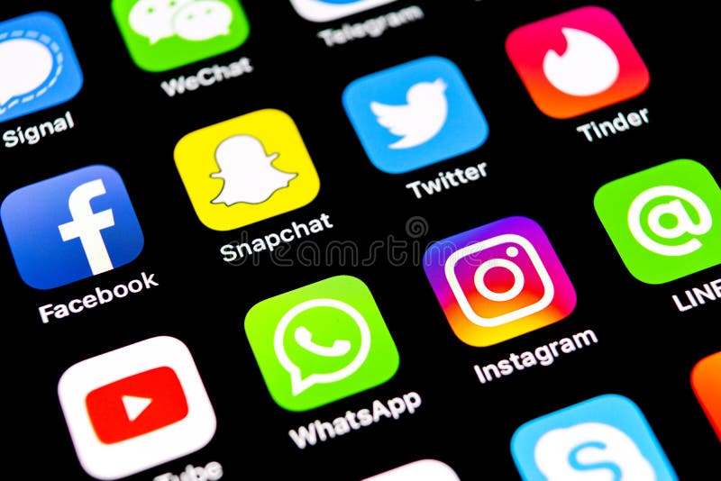 Apple iPhone X with icons of social media facebook, instagram, twitter, snapchat, google application on screen. Social media icons