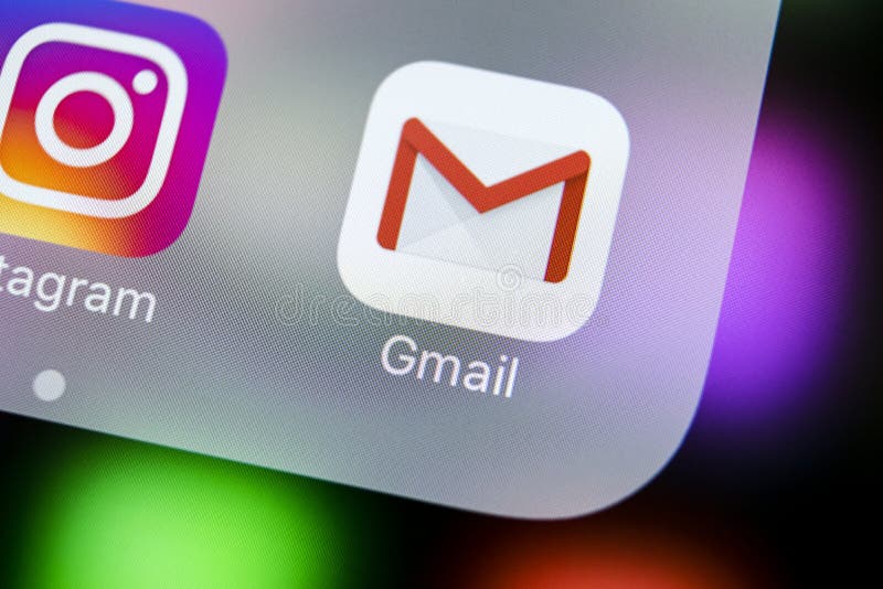 Google Gmail application icon on Apple iPhone X smartphone screen close-up. Gmail app icon. Gmail is popular Internet online e-ma royalty free stock photography