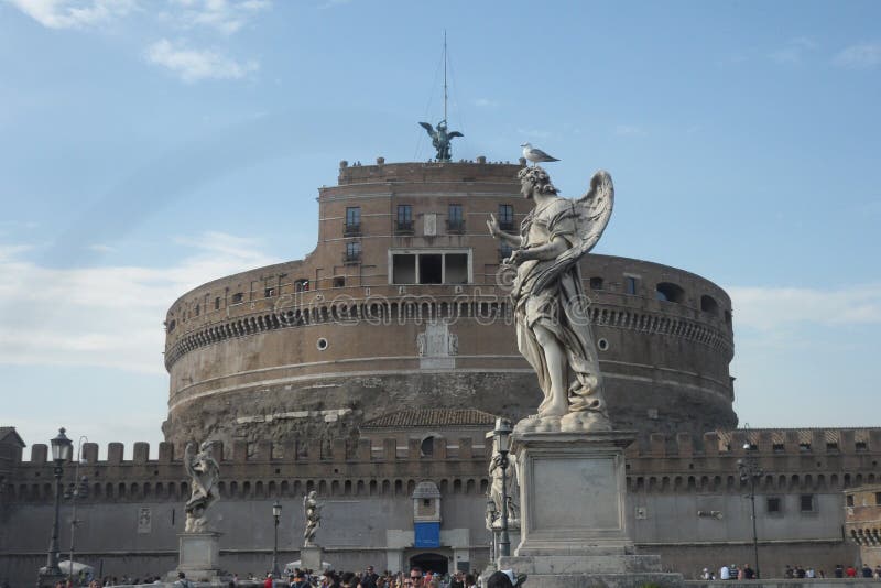 Castel Sant`Angelo overlooking the right bank of the Tiber river which bathes the city of Rome. It is also called Mausoleo di Adriano and is located a short distance from the Vatican. The castle has been radically modified several times in the medieval and Renaissance periods. Castel Sant`Angelo overlooking the right bank of the Tiber river which bathes the city of Rome. It is also called Mausoleo di Adriano and is located a short distance from the Vatican. The castle has been radically modified several times in the medieval and Renaissance periods