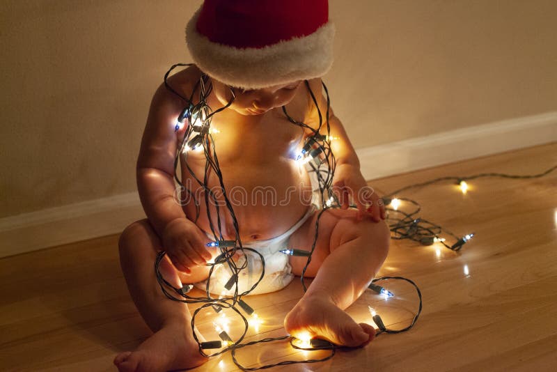 Santa baby and white lights royalty free stock photos Santa baby and white lights royalty free stock photos