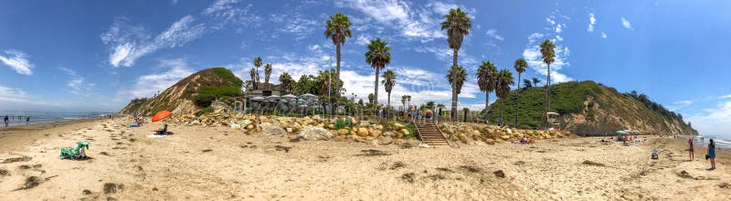 SANTA BARBARA, CA - AUGUST 2, 2017: Tourists enjoy city beach. Santa Barbara is a famous tourist destination in California. SANTA BARBARA, CA - AUGUST 2, 2017: Tourists enjoy city beach. Santa Barbara is a famous tourist destination in California.