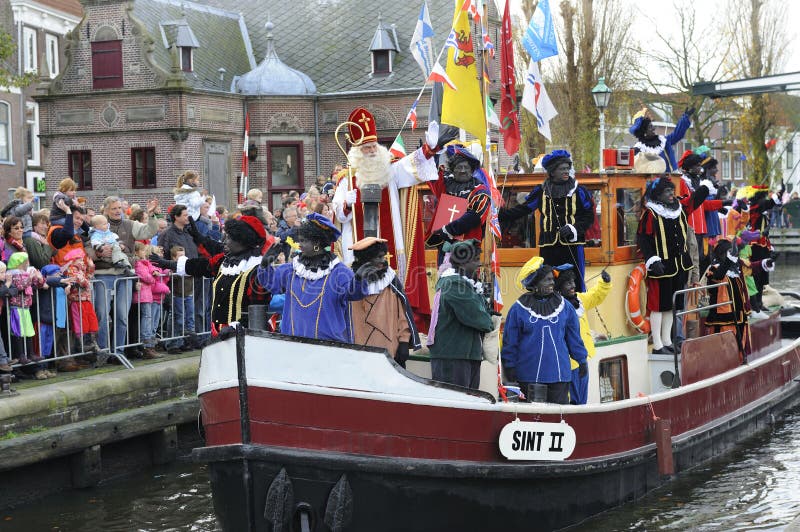 Santa Claus arrives on a boat from Spain in Holland. This is a typical Dutch folklore at the 5th of December. Folklore costumes stock images, royalty-free photos and pictures