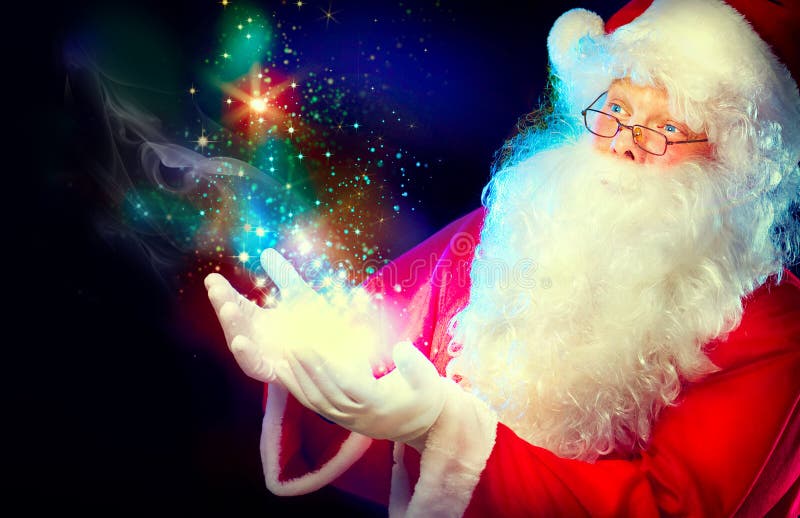 Santa Claus avec la magie dans des ses mains images libres de droits Santa Claus avec la magie dans des ses mains images libres de droits